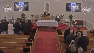 Congregation Sings 'Victory in Jesus'