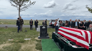 Please Rise for Playing of Taps